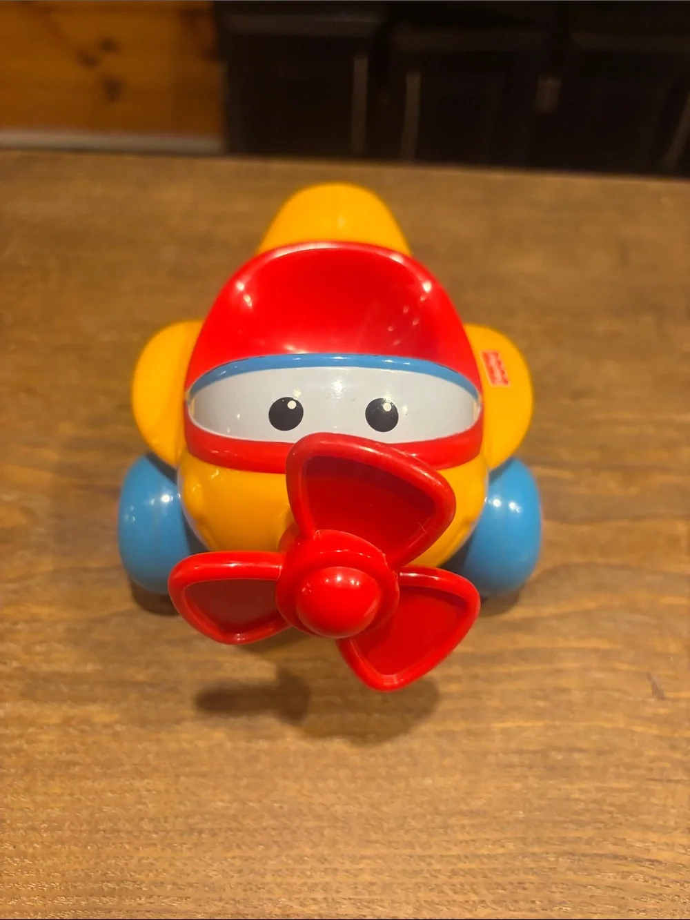 Fisher-Price Bright Yellow and Red Toddler Push Airplane with Blue Wheels